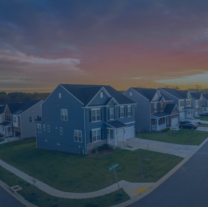 suburban homes at sunset